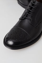 Eleganti scarpe Oxford Wingtip in pelle nera