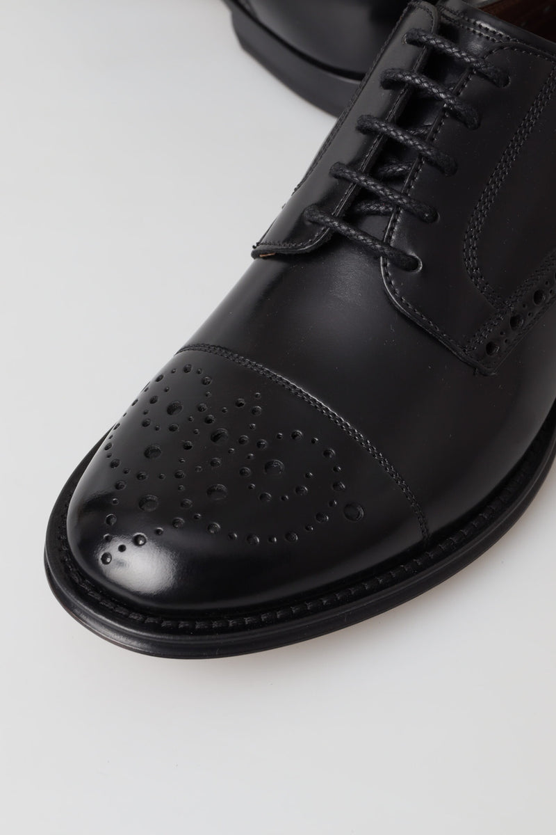 Elegante schwarze Leder Oxford Wingtip Schuhe