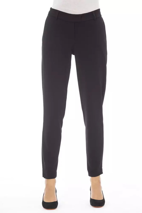 Elegantes pantalones negros con bolsillos de ribete laterales