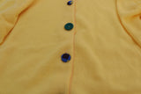 Pull en coton jaune rayonnant