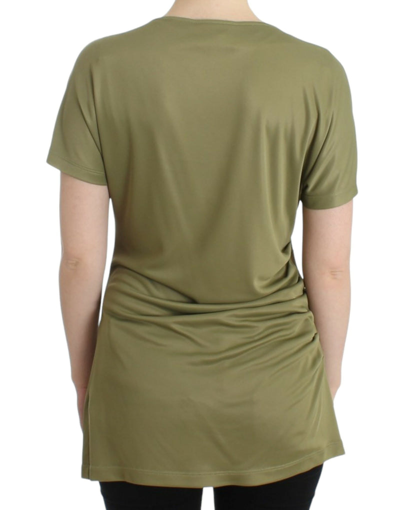 Elegante blusa de jersey verde con acentos de oro