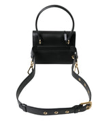 Elegante borsa per cintura in pelle nera con accenti d'oro