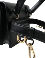 Elegante borsa per cintura in pelle nera con accenti d'oro