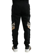 Elegantes pantalones de jogger de leopardo negro