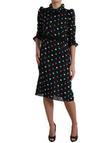 Elegantes hohes Nackenpolka Dot Midi Kleid