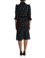 Elegantes hohes Nackenpolka Dot Midi Kleid