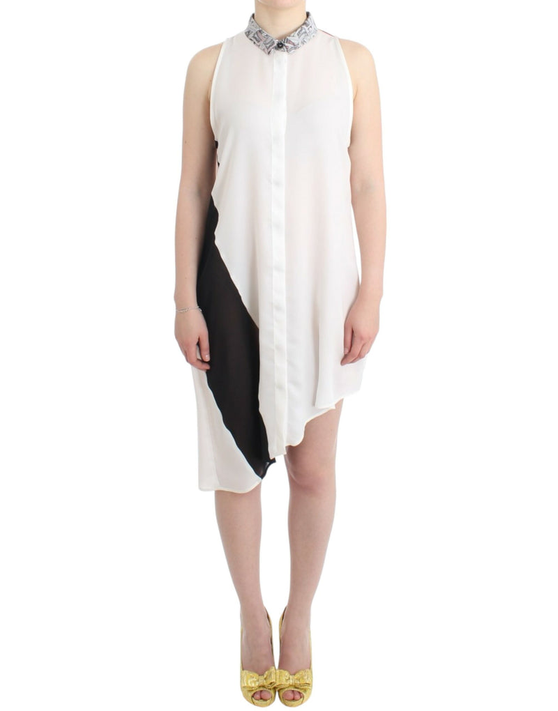 Robe de chemise boutonnée à l'ourlet asymétrique