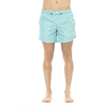 Sleek Light Blue Swim Shorts con estampado delantero