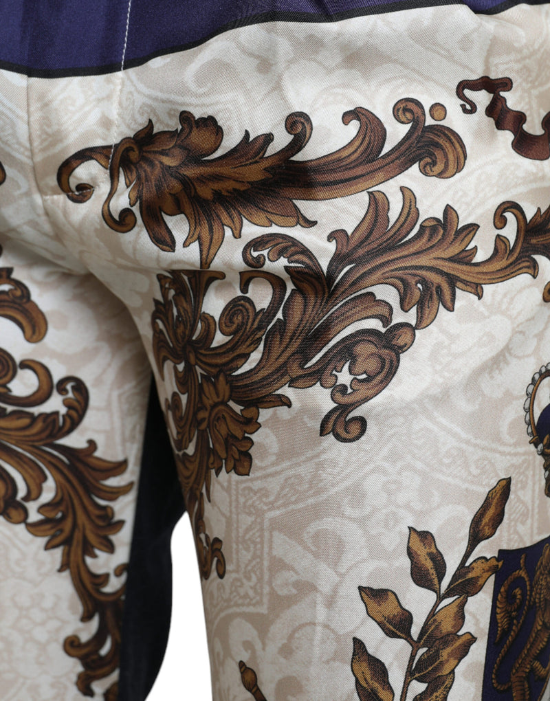 Elegante Seidenhose mit Heraldic -Druck