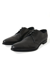 Elegantes zapatos de vestir derby de cuero negro