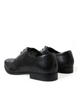 Elegantes zapatos de vestir derby de cuero negro