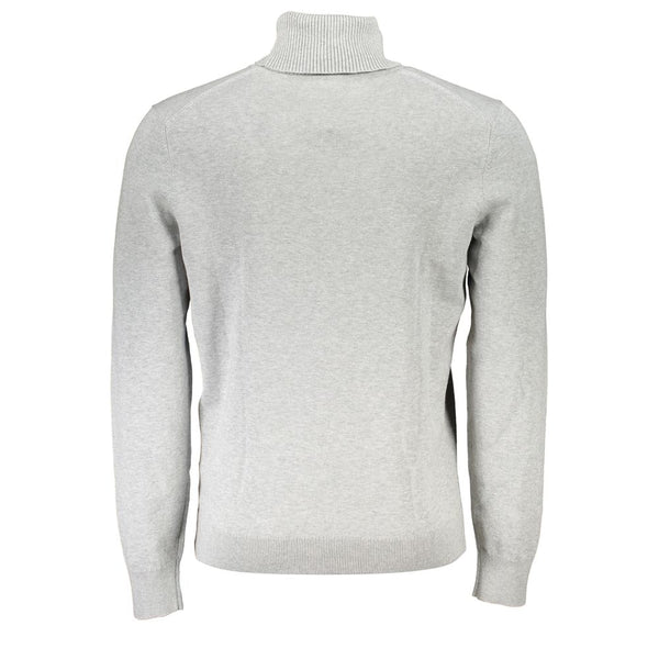 Eleganter grauer Rollkragenpullover mit Stickerei