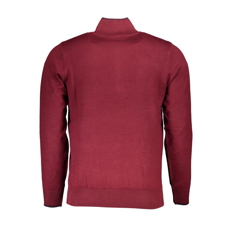 Pull d'élégant demi-zip avec détail de broderie