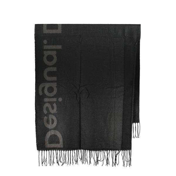 DETTAGLIO DI CONTROTTO CHIC poncho in nero senza tempo