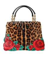 Chic Leopard verziert die Tasche mit roten Rosen!