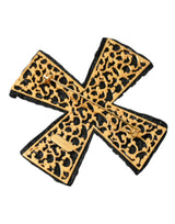 Broche à broches croisées ornées de cristaux noirs