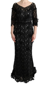 Elegante abito maxi nero con applique floreale