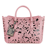 Sac à main de la peau de veau rose chic avec des accents floraux