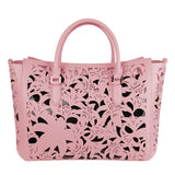 Sac à main de la peau de veau rose chic avec des accents floraux