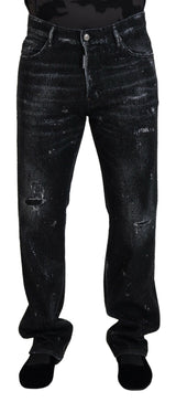 Jeans in denim a brandelli abbelliti in cristallo nero