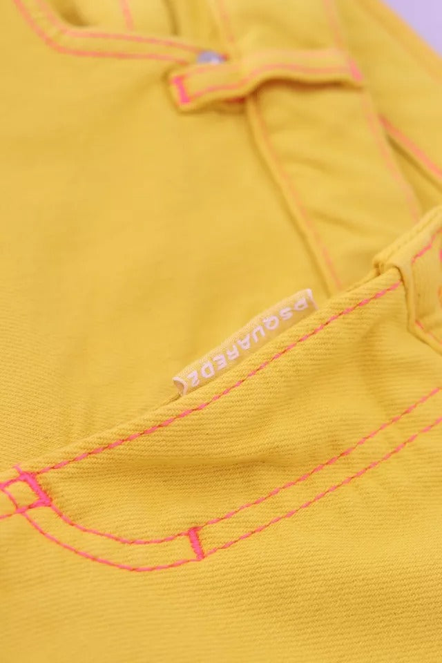 Jeans de mezclilla con cintura baja de algodón amarillo