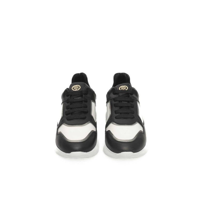 Sneaker in pelle di mucca in bianco e nero