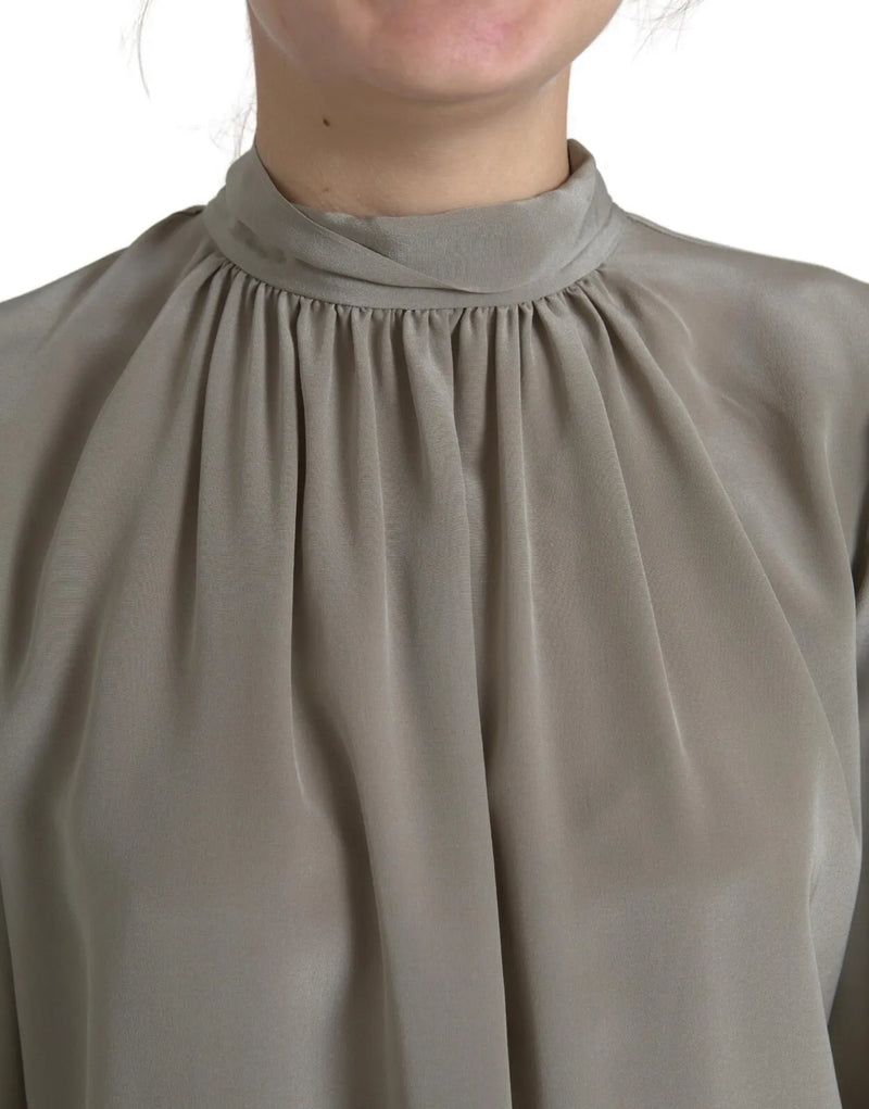 Blusa superior de mangas largas con cuello simulado