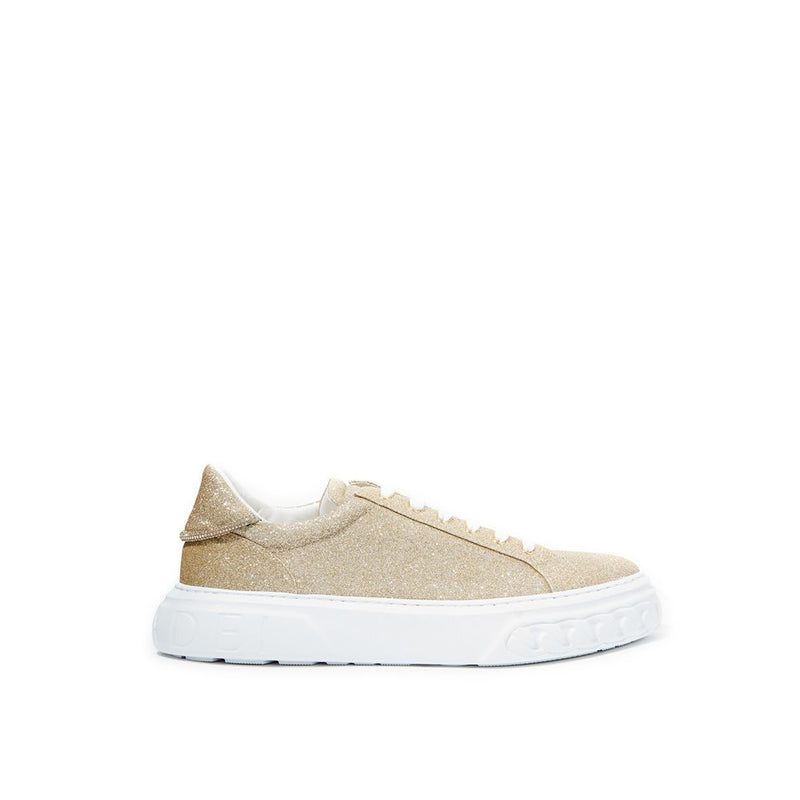 Eleganti sneaker in pelle dorata