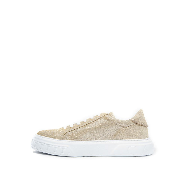 Eleganti sneaker in pelle dorata