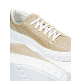 Elegante goldene Leder -Turnschuhe