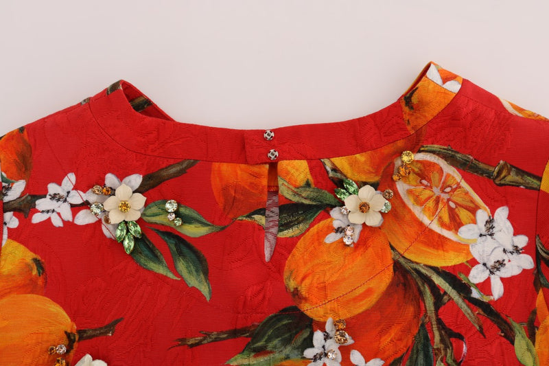 Blusa de crepé adornada con estampado de flor