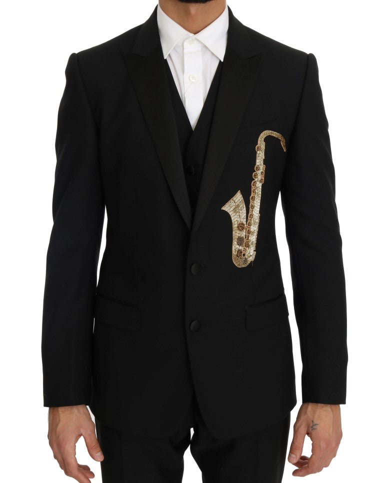 Costume élégant en trois pièces noires avec broderie de saxophone