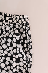 Eleganti pantaloni a vita alta a pois in seta