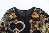 Elegante blusa de seda con estampado medieval