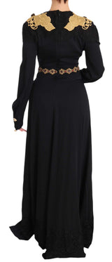 Elegante vestido negro maxi con detalles dorados