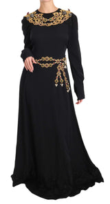 Elegante vestido negro maxi con detalles dorados