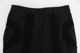 Elegantes pantalones negros de Torero Capri