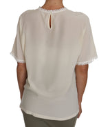 Tapa de blusa detallada de encaje de seda crema