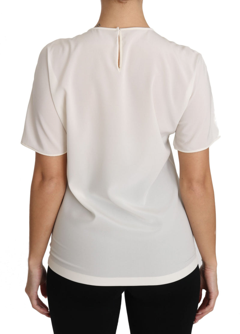 Elegante blusa de cuello de seda con apliques