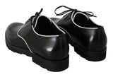 Elegantes zapatos de vestir derby de cuero negro