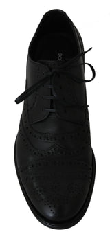 Eleganti scarpe abiti a Wingtip in pelle nera