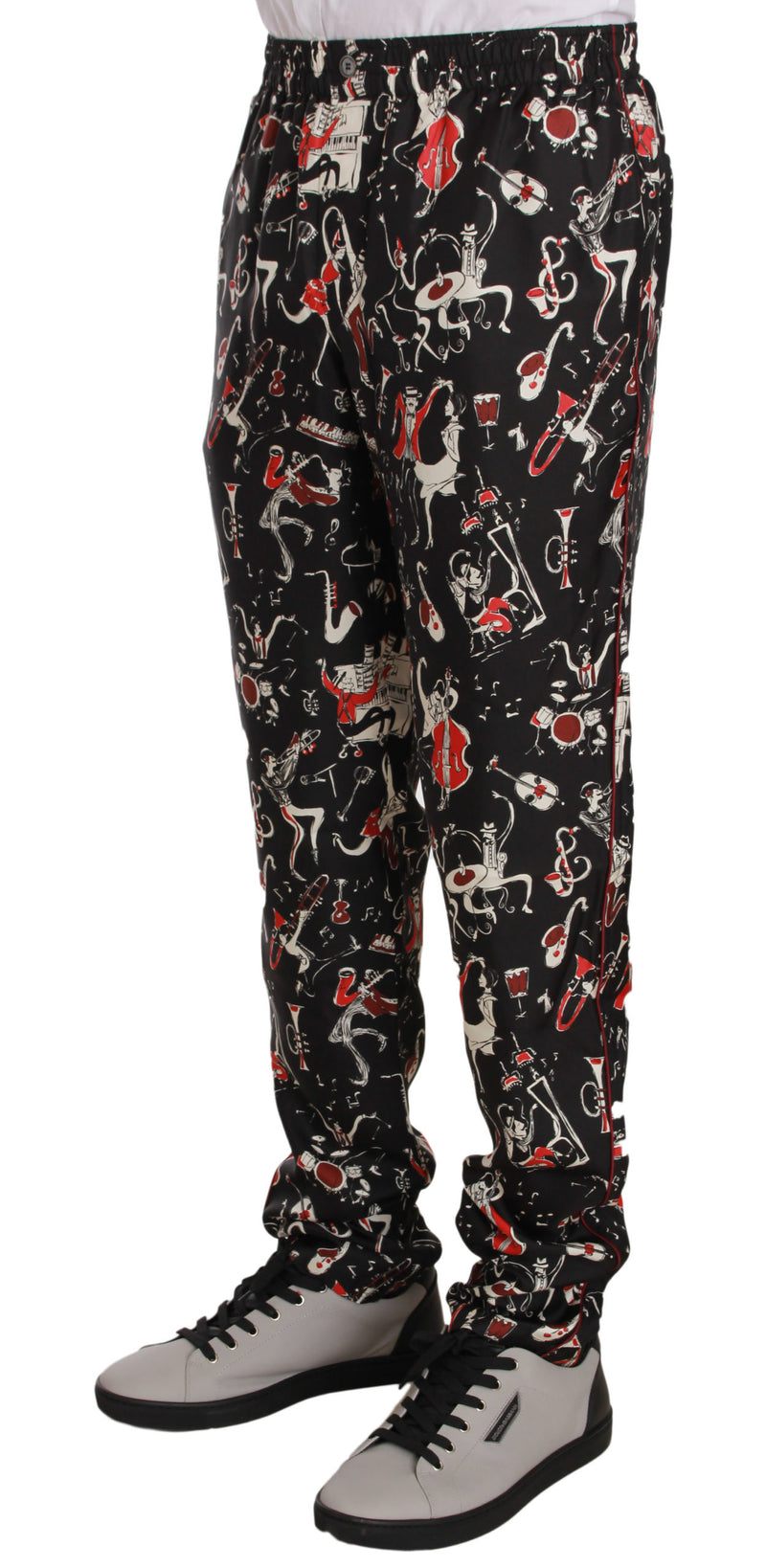 Elegantes pantalones de salón de seda negro con estampado rojo